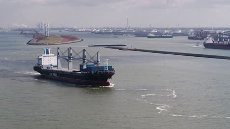 container ship navigating a european port