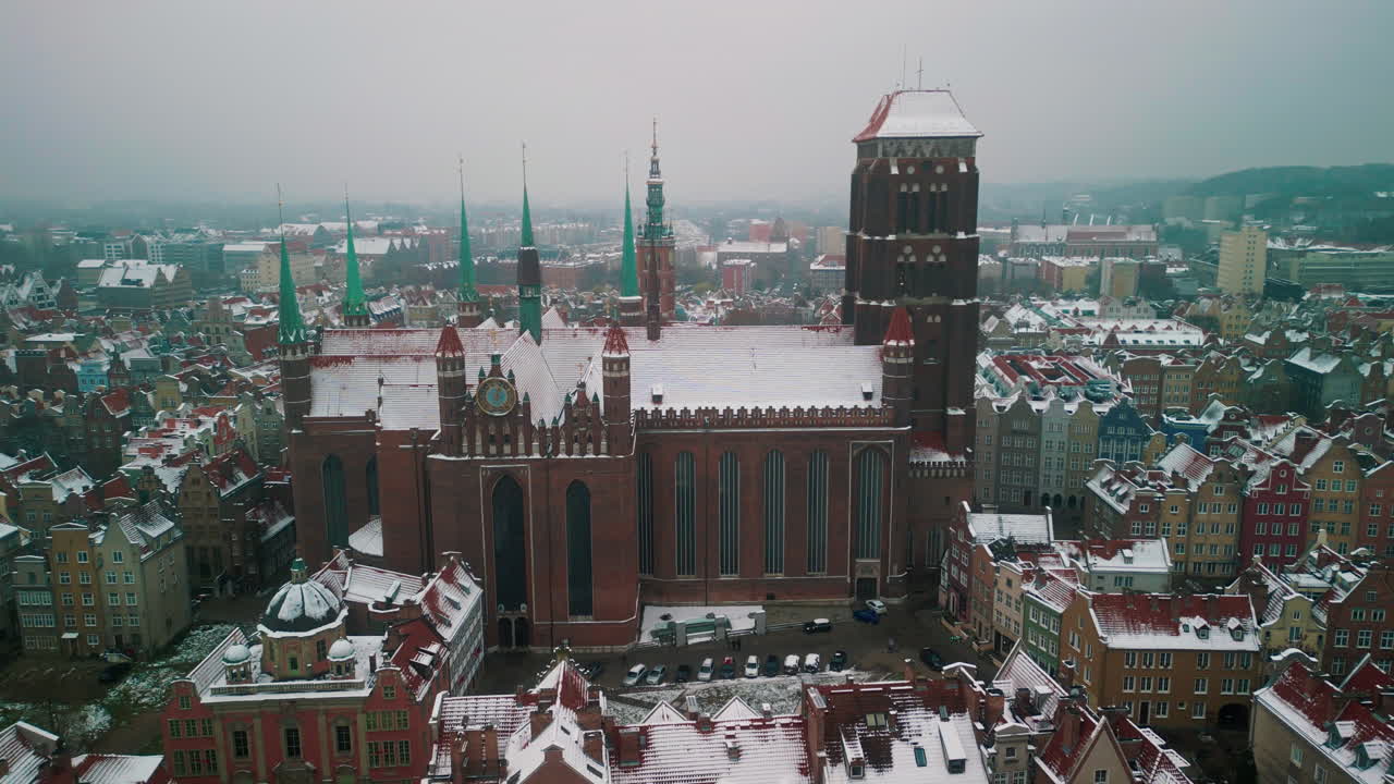 Gdansk in Winter: A Snowy View of St. Mary's Church