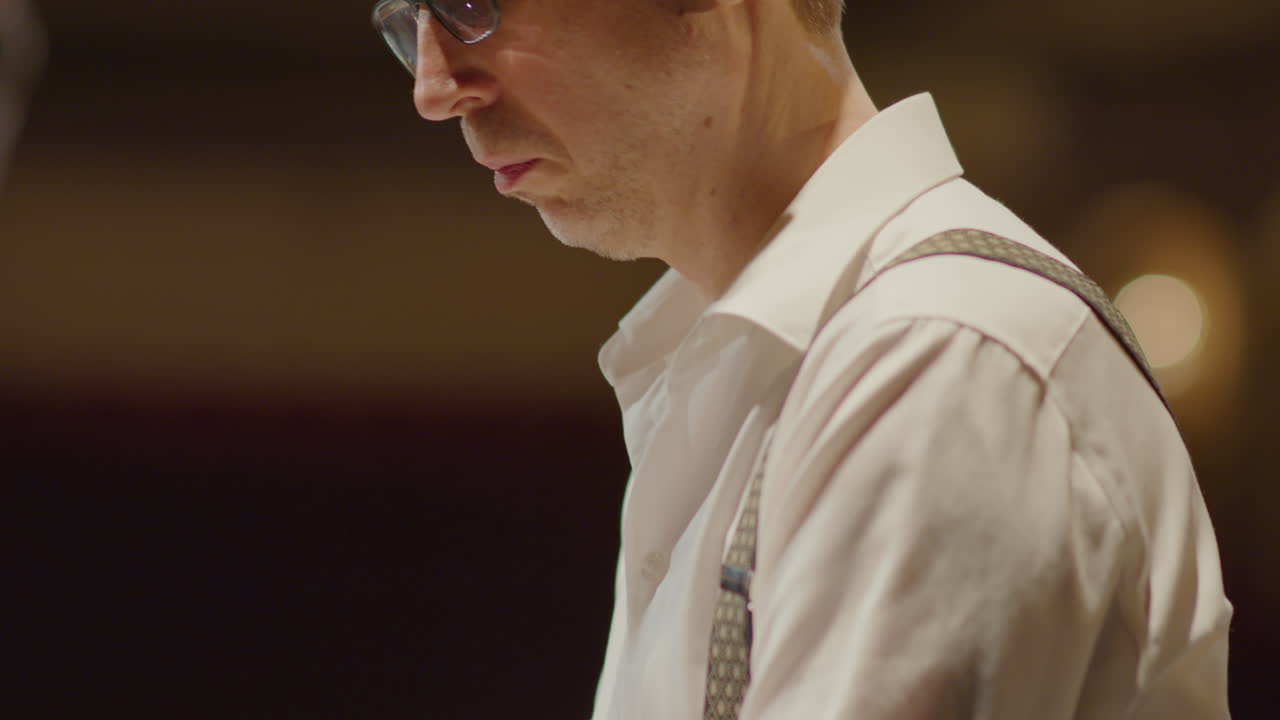 Piano Player Performing on Stage during Concert