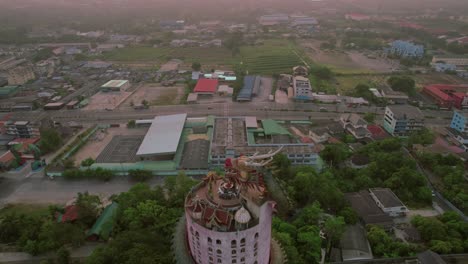 drone circling around of the wat sam phran, the dragon temple in bangkok, thailand