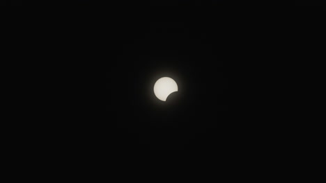 the sun in the first quarter of the partial phase of the total solar eclipse in 2024