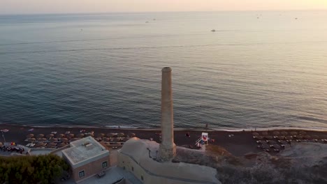 Aerial-Panoramic-Shot-of-Tomato-Industrial-Museum-Santorini,-Greece