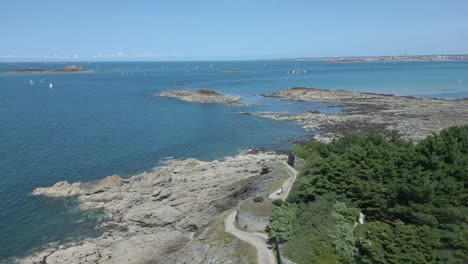 Dinard-beach-and-coast-in-France-with-sailboats-sailing