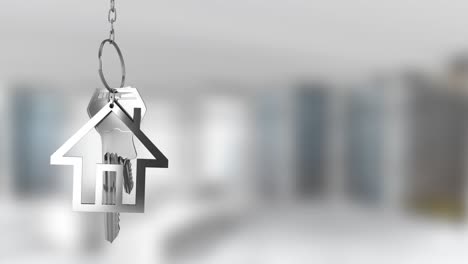 animation of silver house keys hanging against blurred background with copy space