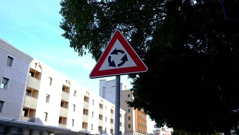 triangular road sign instruct drivers move roundabout