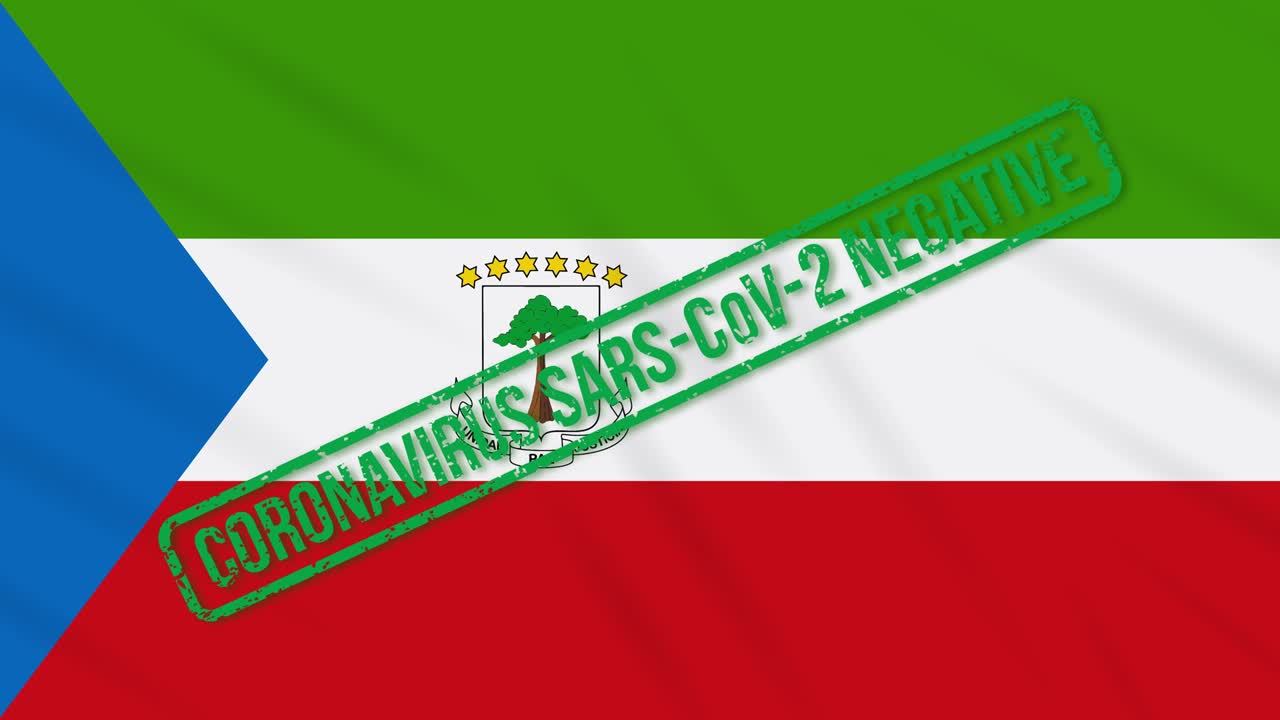 에토리얼 기니의 발은 코로나 바이러스로부터의 자유의 녹색 스프로 흔들리고 있습니다.