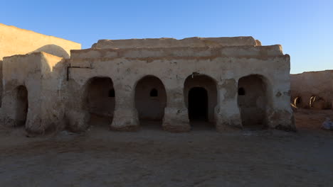 sunrise at the iconic star wars tatooine set in the desert, clear sky