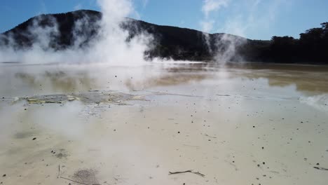 steam on active geothermal area in taupo volcanic zone, north island new zealand