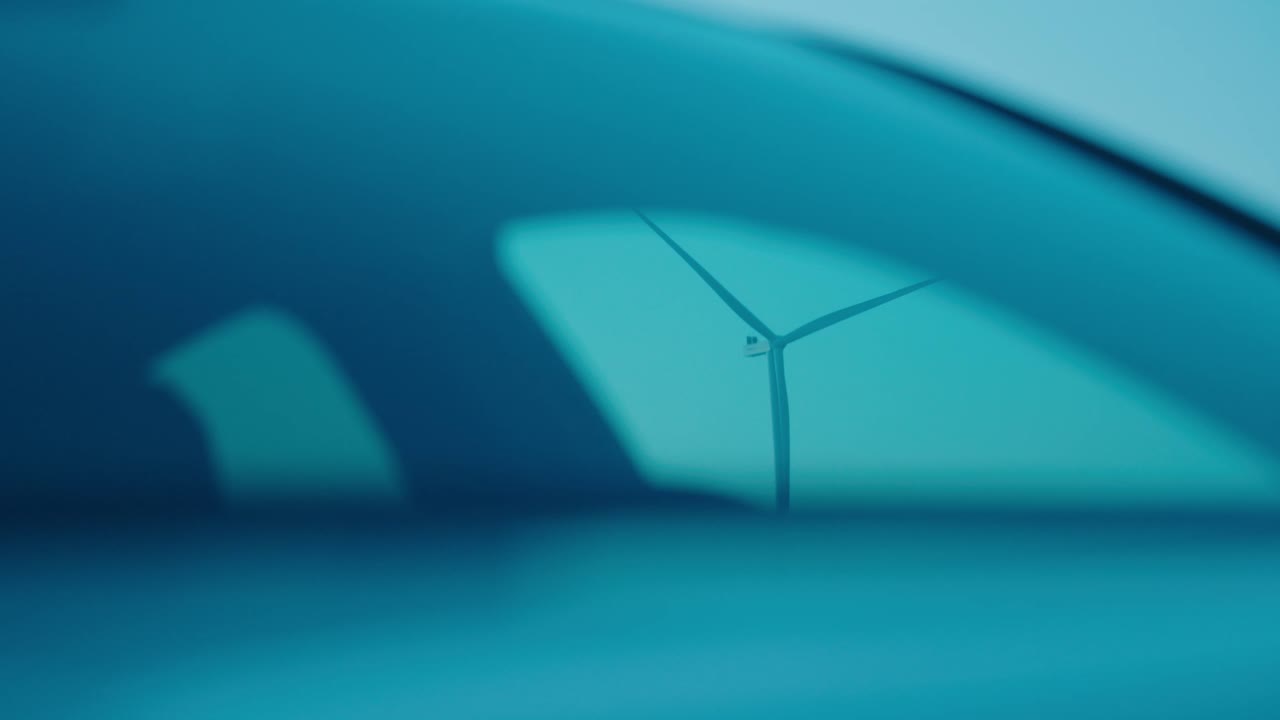View from a Car Towards a Wind Turbine