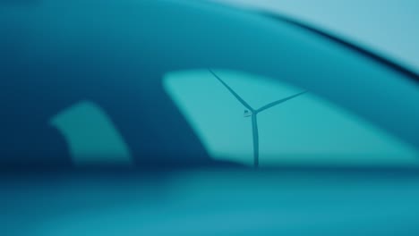 view from a car towards a wind turbine