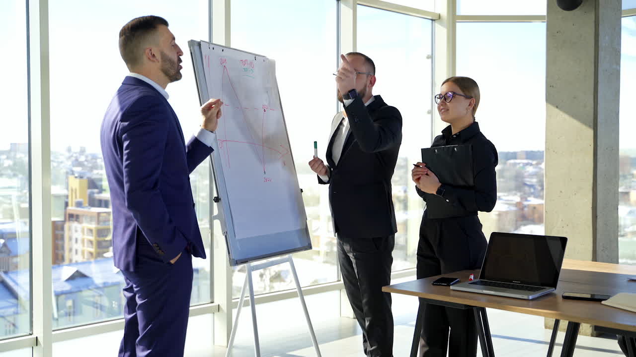Successful business people work together. Businessmen in suits and beautiful woman talking near the white board and planning new strategy in office.
