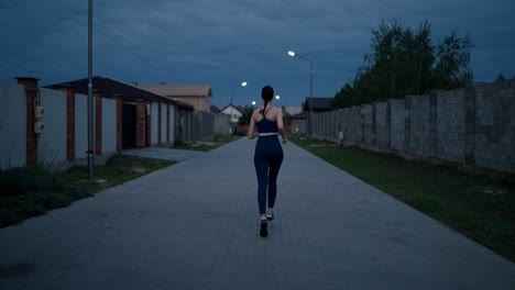 woman running at dusk in residential area