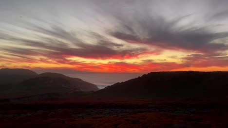 A-spectacular-twilight-sky-show-also-known-as-"sailor's-delight"-hovers-right-above-the-ocean-horizon-of-Monterey-Bay,-California-on-December-21,-2020