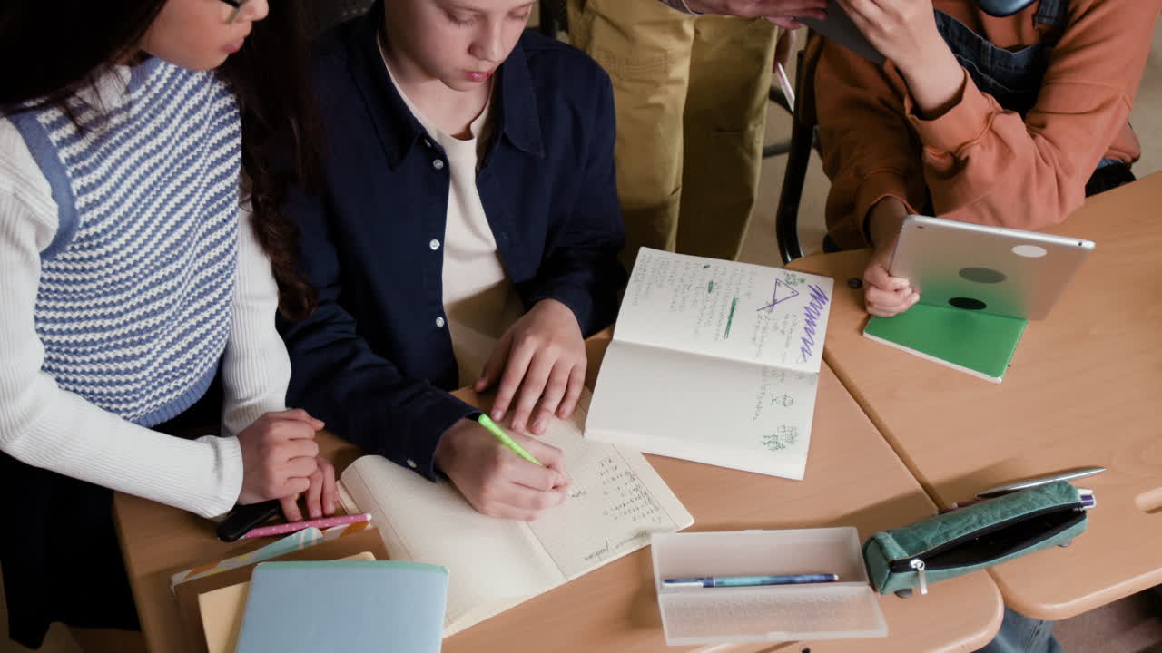 Students Collaborating and Learning in a Classroom