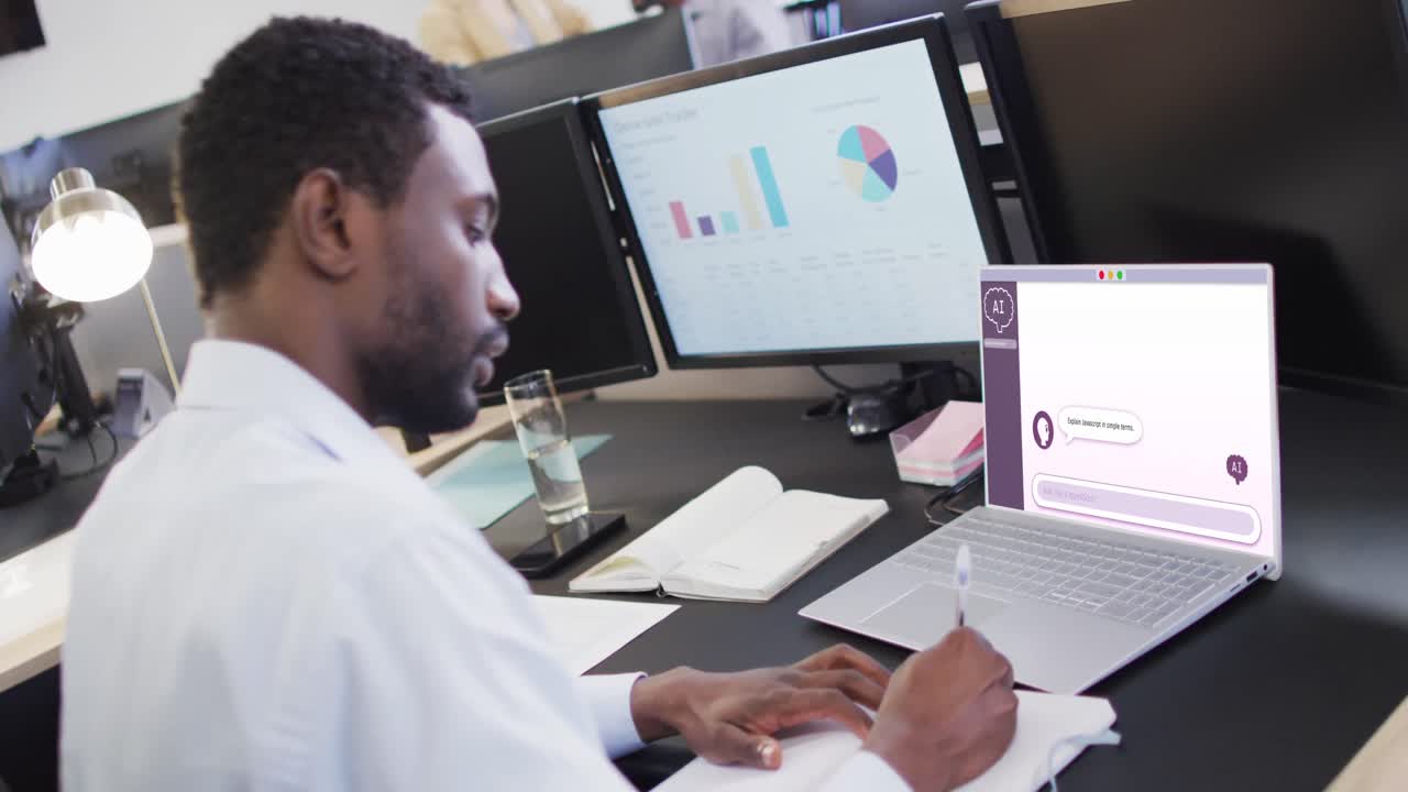 Composition of african american businessman using laptop with ai chat on screen