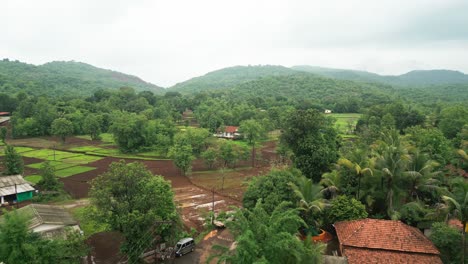 small village in hill station in rainy season drone view