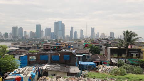 Dhobi-Ghat-(Mahalaxmi-Dhobi-Ghat)-was-an-open-air-laundromat-(lavoir)-in-Mumbai,-India.-The-washers,-known-as-dhobis,-work-in-the-open-to-clean-clothes-and-linens-from-Mumbai's-hotels-and-hospitals.