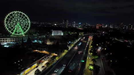 aerial view rising over traffic on the periferico, nighttime in mexico city
