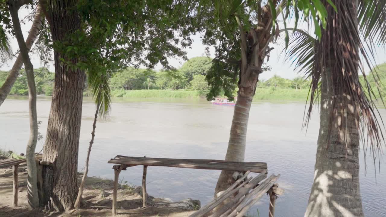 Scenic River View with Trees and Boat