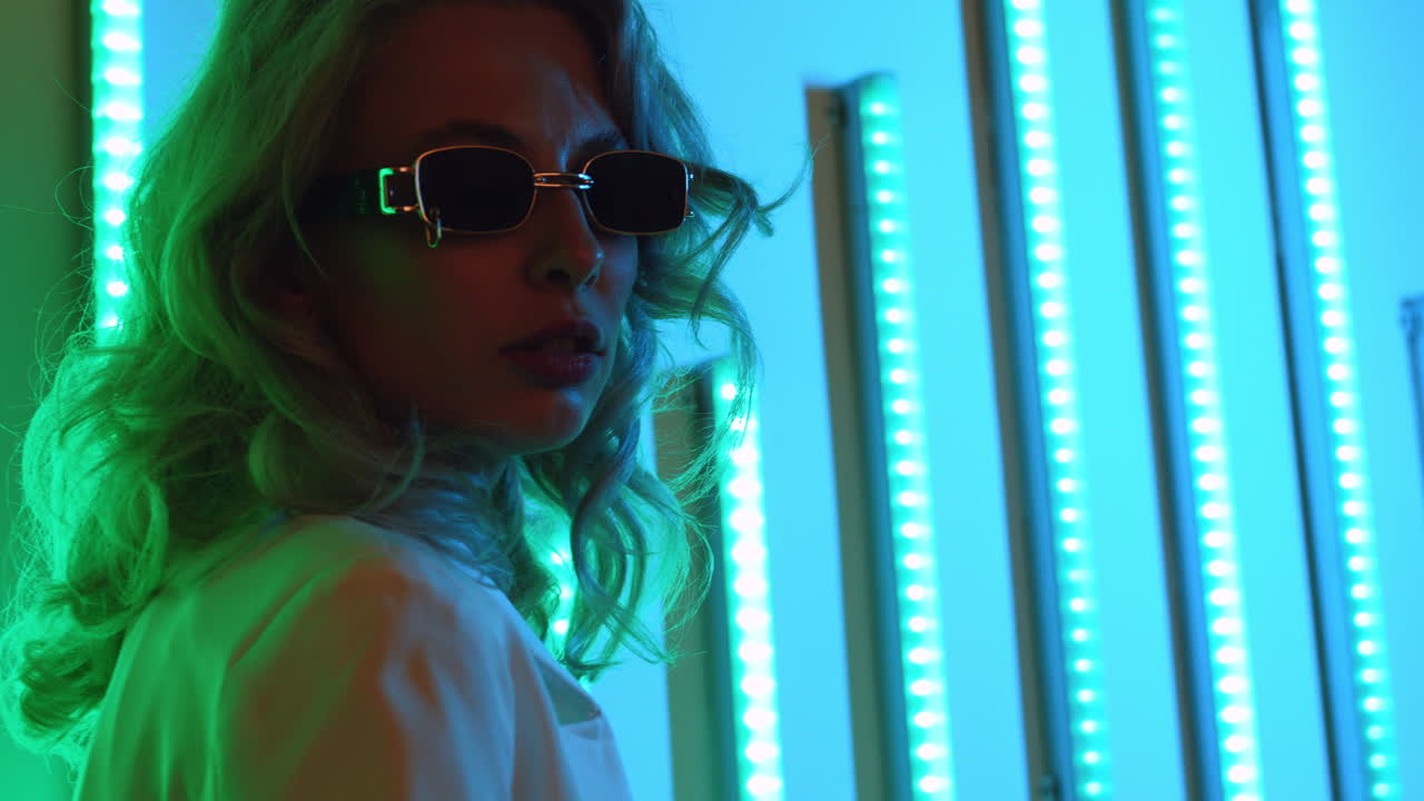 Fashion model wearing white suit