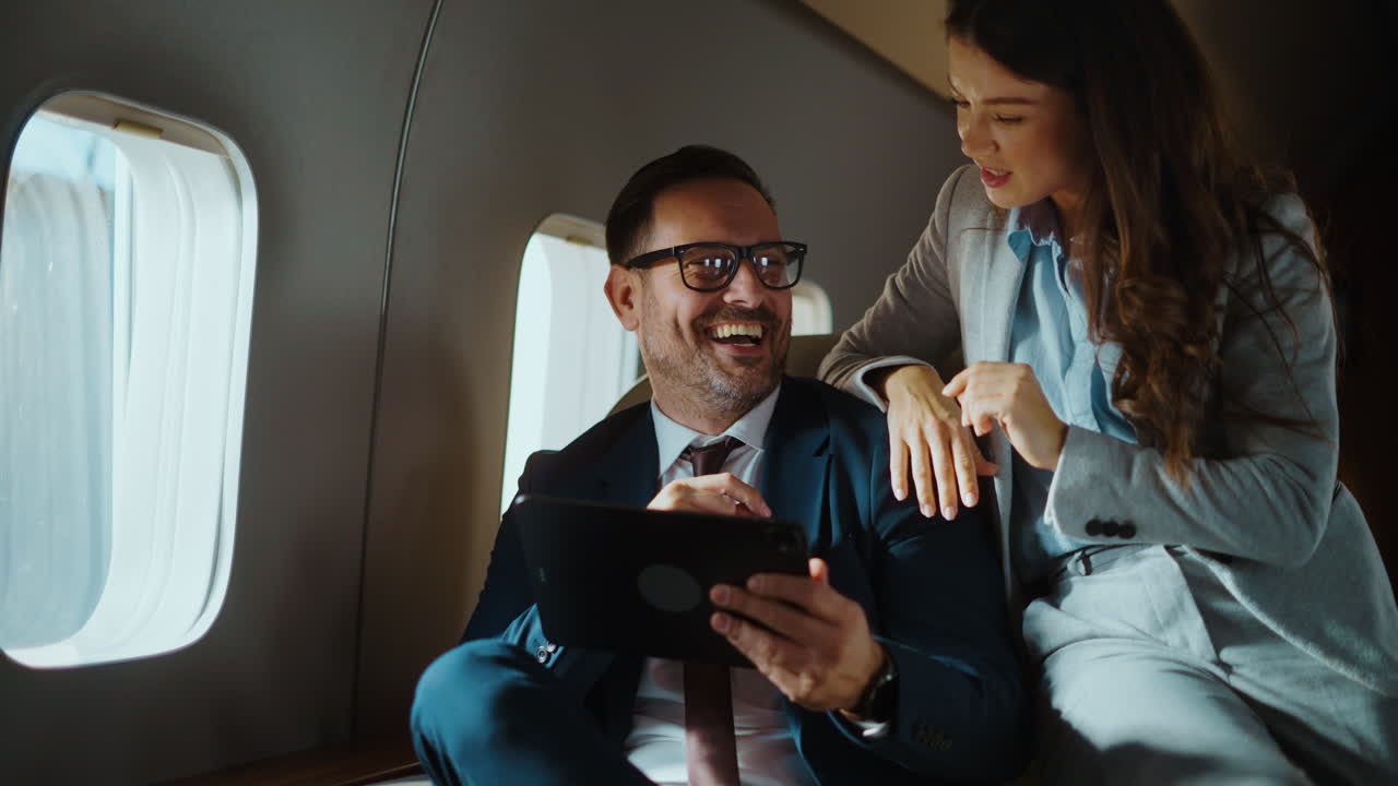 Business People Working on a Private Jet