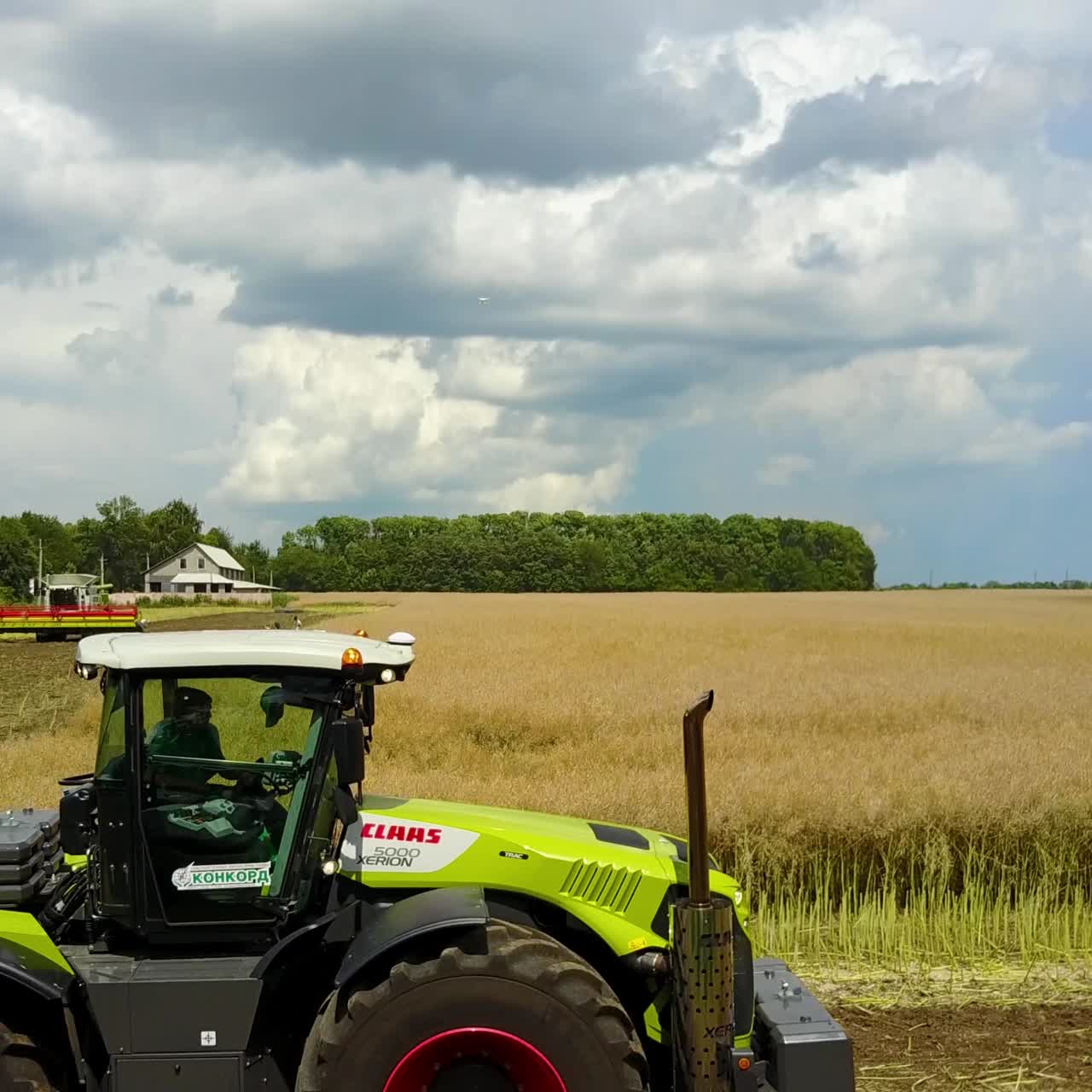 Tractor Working In The Agricultural Field