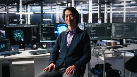 smiling data center manager filming presentation, showcasing ai equipment