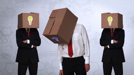 equipo de hombres de negocios escondiendo la cabeza con la caja