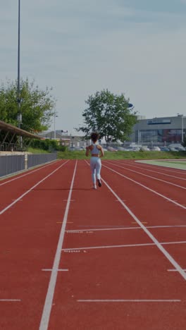 woman running on a track