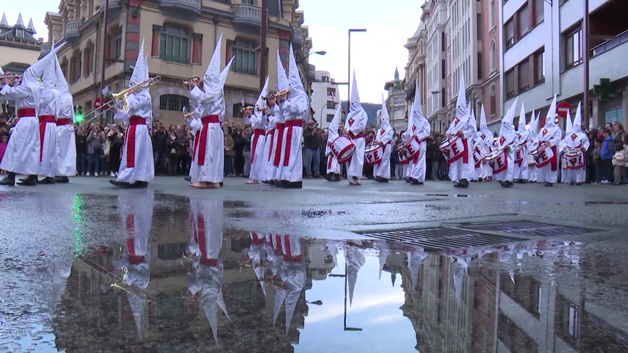 Religious Procession in White Robes