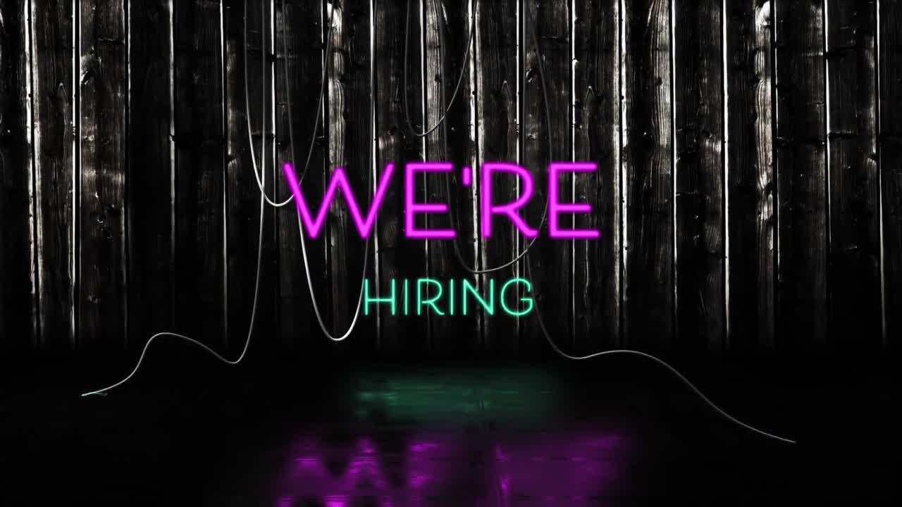 Animation of we're hiring text in pink and blue neon letters on black background