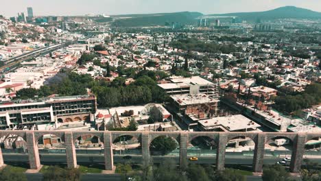 Lateral-view-of-Arcos-de-Queretaro-in-Mexico-seen-from-a-drone