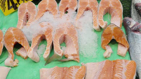 fresh salmon and sea bass at the fish market