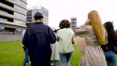 group of  people in a protest with megaphones and placards 4