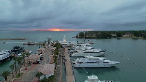 Luxury-yacht-boats-moored-in-port-of-Casa-de-Campo-Marina-at-sunset,-La-Romana-in-Dominican-Republic