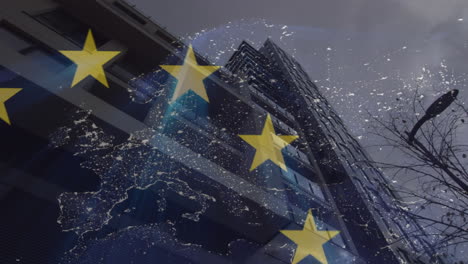 animation of flag of european union over map of connections and high rise building in modern city