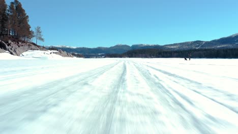 Aerial-View-Ski-Track-Lines-On-Snow-During-Winter