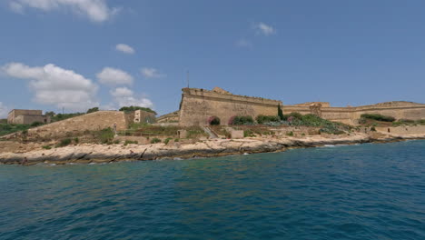 coast of island historical malta,valletta on the mediterranean sea, pan left