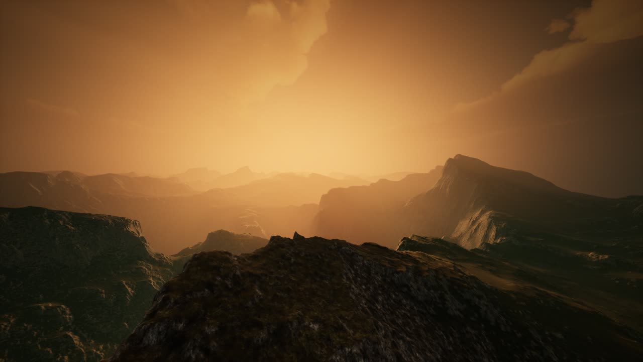 High mountain peaks covered with dramatic heavy fog