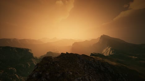 high mountain peaks covered with dramatic heavy fog