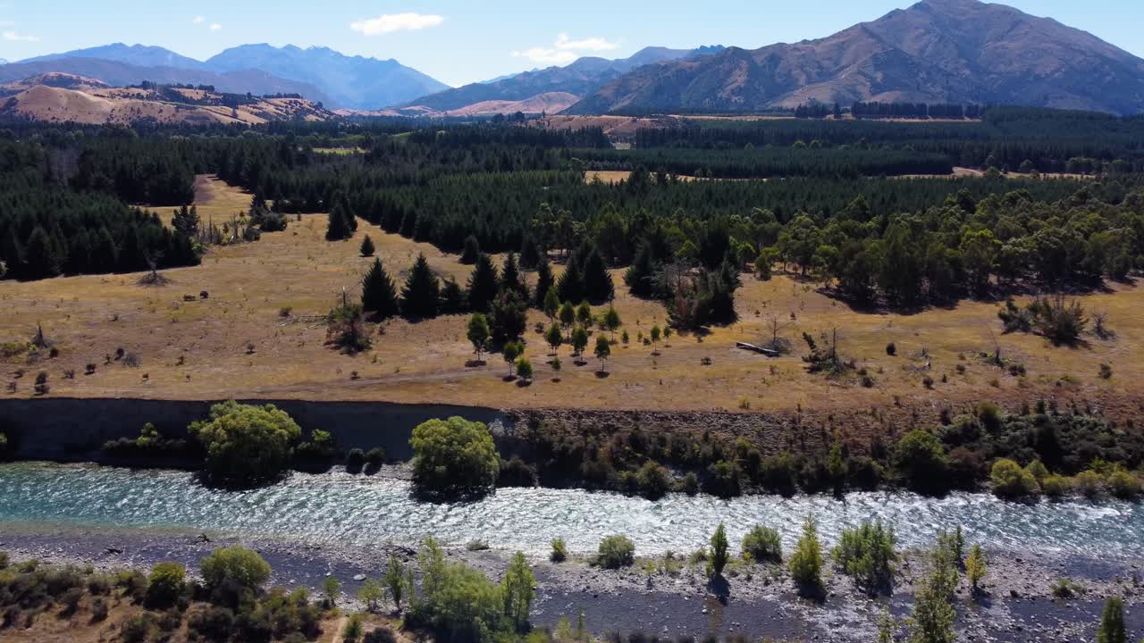 AERIAL Side Panning Shot of a Beautiful Mountain Landscape and a River in South Island, New Zeland