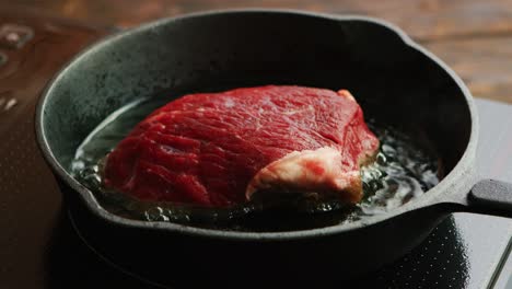 meat frying on pan