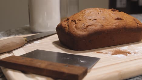 fresh loaf of homemade banana bread with left to right slide