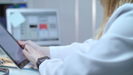 female doctor using tablet at medical workplace. nurse using tablet pc