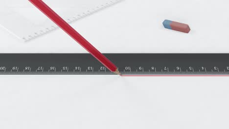 red pencil draws a line along the ruler