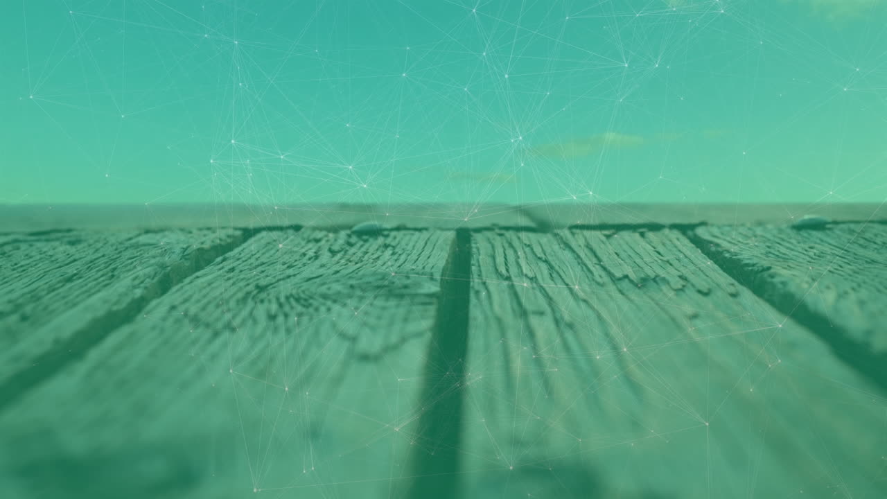 animación de una red de conexiones en primer plano de una tabla de madera contra las nubes en el cielo