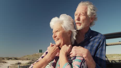 Senior-couple-enjoying-free-time-at-the-beach