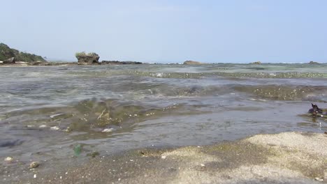 low shot waves on stones beach in garut, west java