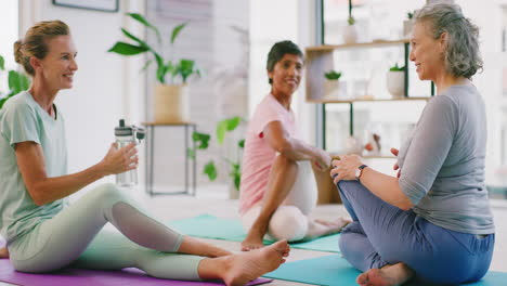 mature women stretching after yoga class