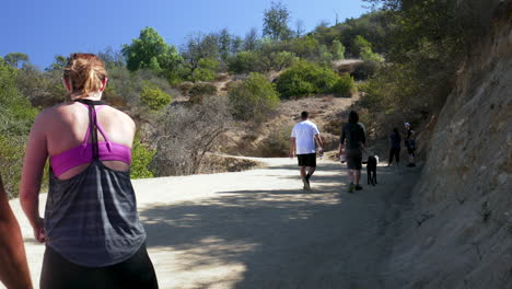 People-walking-up-a-mountain-trail-at-Los-Angeles,-California